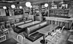 Black and White photo fo Subculture interior, tables, beer bar